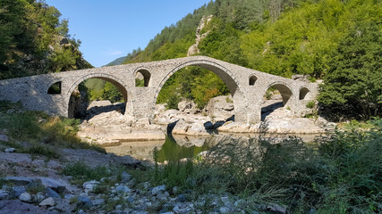 Fototapeta na wymiar Landscape of medieval Devil's Bridge, Arda river and Rhodopes mountain, Kardzhali Region, Bulgaria