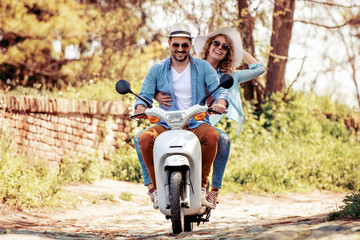 Couple in love riding a scooter © ivanko80