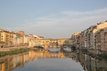 Beautiful view of the Ponte Vecchio bridge across the Arno River in Florence, Italy