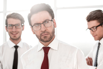 Obraz premium close up.confident businessman on background of colleagues