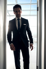 Fototapeta premium serious businessman leaves his office.