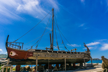 Historical wooden shipwreck reconstruction on land, Urla, Izmir, Turkey. Ancient Greek culture,...