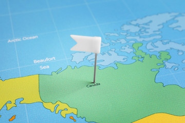 Canada pinned on map, closeup