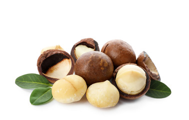 Pile of organic Macadamia nuts on white background