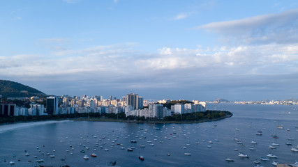 Aerial view on the drone cove of Botafogo in Rio de Janeiro, sea and boats in the late afternoon