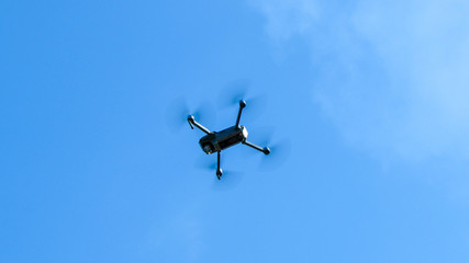 Drone flying with blue sky