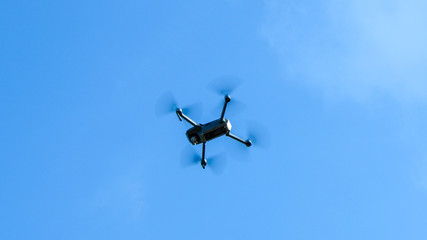 Drone flying with blue sky