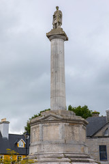 Fototapeta premium Octagon Column and Statue of St. Patrick in Westport
