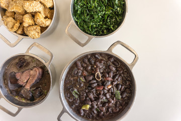 Ingredients of feijoada, typical food of Brazil