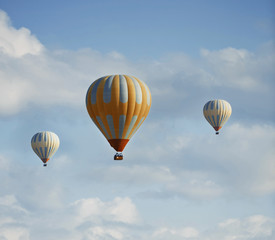 Fototapeta premium Three air balloons flying in the sky