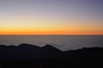 Sunrise at the summit of Haleakala volcano on the island of Maui, Hawaii.
