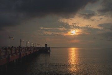 This is moment in the morning on pier ,which it's beautiful light of sunrise, Prachuap Khiri Khan province,Thailand