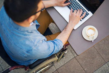 Handicapped man in cafe