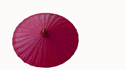 Red umbrella umbrella made of fabric with a white background.