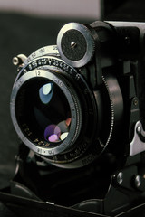 Fototapeta na wymiar Old film camera with a frame size of 6x9 cm