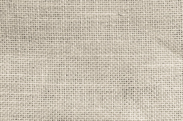 Vintage abstract Hessian or sackcloth fabric or hemp sack texture background. Wallpaper of artistic wale linen canvas. Blanket or Curtain of cotton pattern with copy space for text decoration.