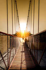 Suspension bridge  against the sunlight