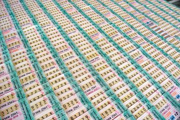 rows of lottery tickets in thailand