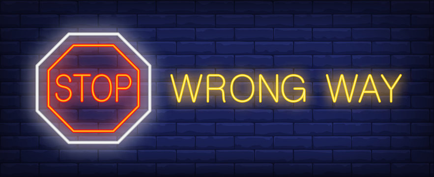 Stop, wrong way neon text with octagon sign. Caution design. Night bright neon sign, colorful billboard, light banner. Vector illustration in neon style.