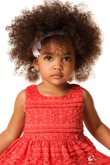 Portrait of little african american girl in studio, isolated