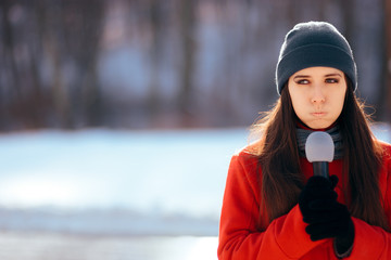 Winter TV Reporter Broadcasting Outdoors in the Snow