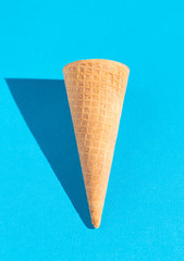 Waffle Ice Cream Cones on a Solid Background with Harsh Lighting