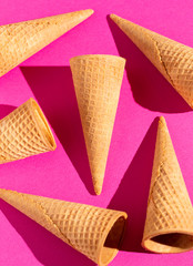 Waffle Ice Cream Cones on a Solid Background with Harsh Lighting