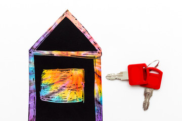rent or buy concept. a house with keys