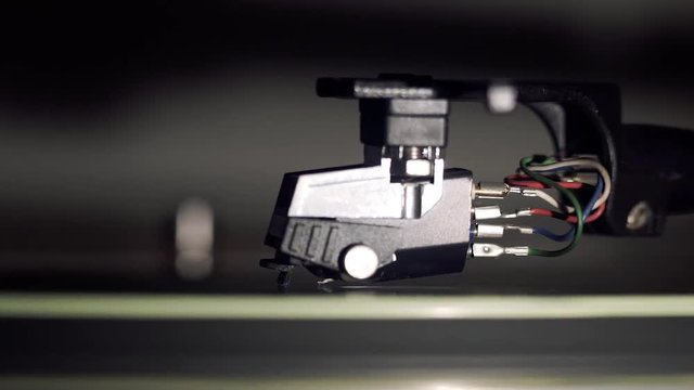 Needle dropping on spinning vinyl record