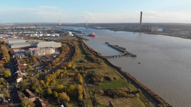 An aerial view of river Thames at Purfleet and the London skyline in the distance