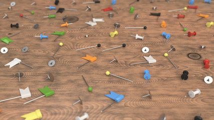Pattern from colorful push pins on wooden background