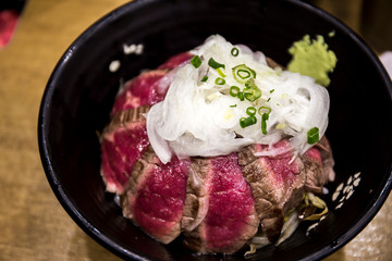 Grilled beef steak, rice, wasabi in the bowl