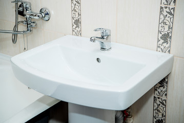 The photo of a sink in a bathroom