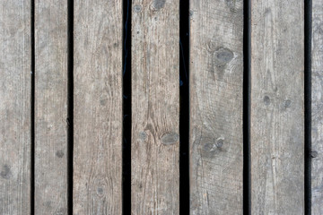 Close up texture of old wooden fence panels background