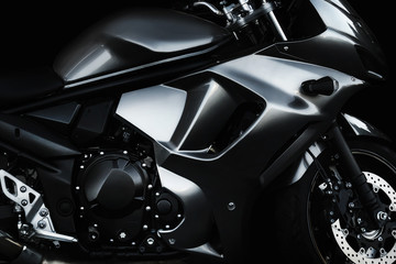 Sportbike motorcycle hood and  body kit black and white profile photo view.