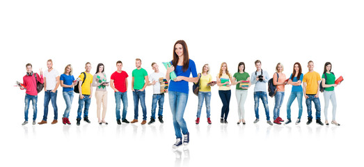 Large group of smiling friends staying together and looking at camera isolated on white background.