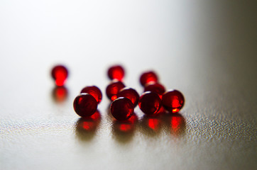 red round nitroglycerin tablets on light background