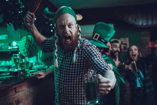 Man with friends celebrating a Saint Patrick's Day