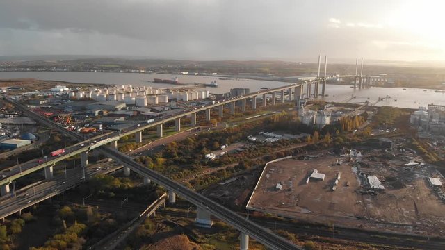A panoramic view of Dartford Crossing tunnel and Queen Elisabeth II bridge at sunset