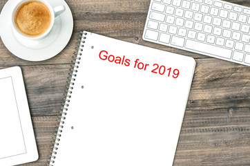 Notebook coffee Office table flat lay Goals 2019