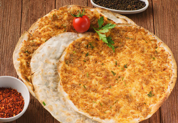 Armenian pizza, lahmajo with slices of lamb, Basil and spices