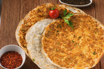 Armenian pizza, lahmajo with slices of lamb, Basil and spices