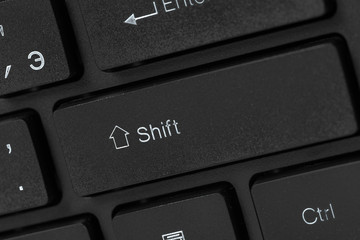Black laptop keyboard close up