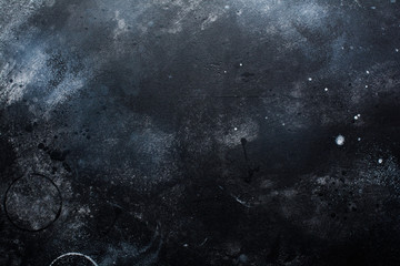 Black Dark stone or slate wall. Grunge texture background.