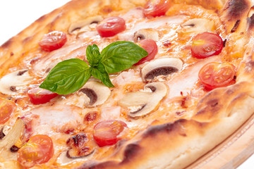 Italian fast food. Delicious hot pizza sliced and served on wooden platter isolated on white background
