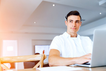 Man working on laptop at home