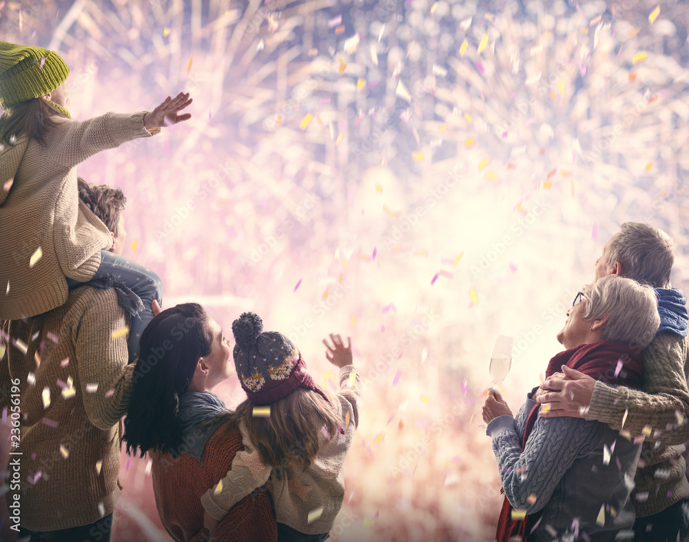 Wall mural family watching fireworks