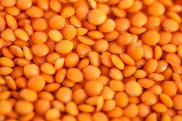 red lentils forming a background pattern, healthy food