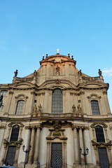 Fototapeta na wymiar Facade of St. Nicholas church in Prague, Czech Republic