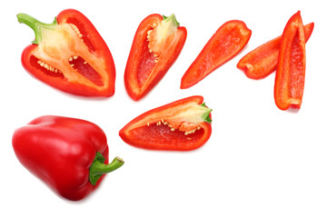 sliced red sweet bell pepper isolated on white background. top view